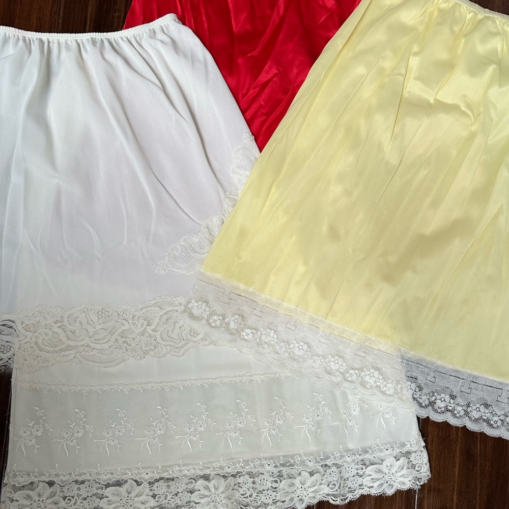 Set of (4) vintage slip skirts lace